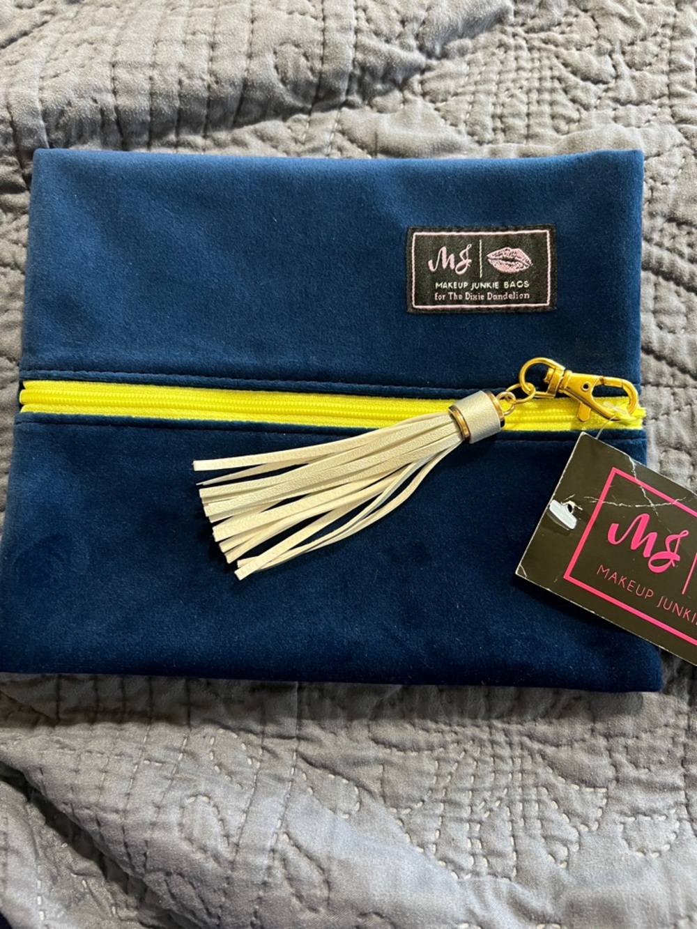 Makeup Junkie Navy Velvet Cosmetic Pouch with yellow Zipper and Silver Tassel